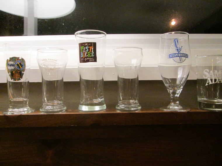 Some of the sample beer glasses from various beer festivals.  Missing are any plastic glasses... I try to never drink out of a plastic glass.